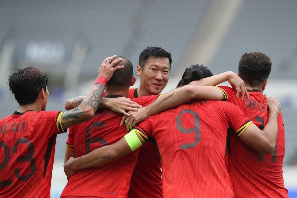 中国队决心登顶国际足球赛事，备战夺冠